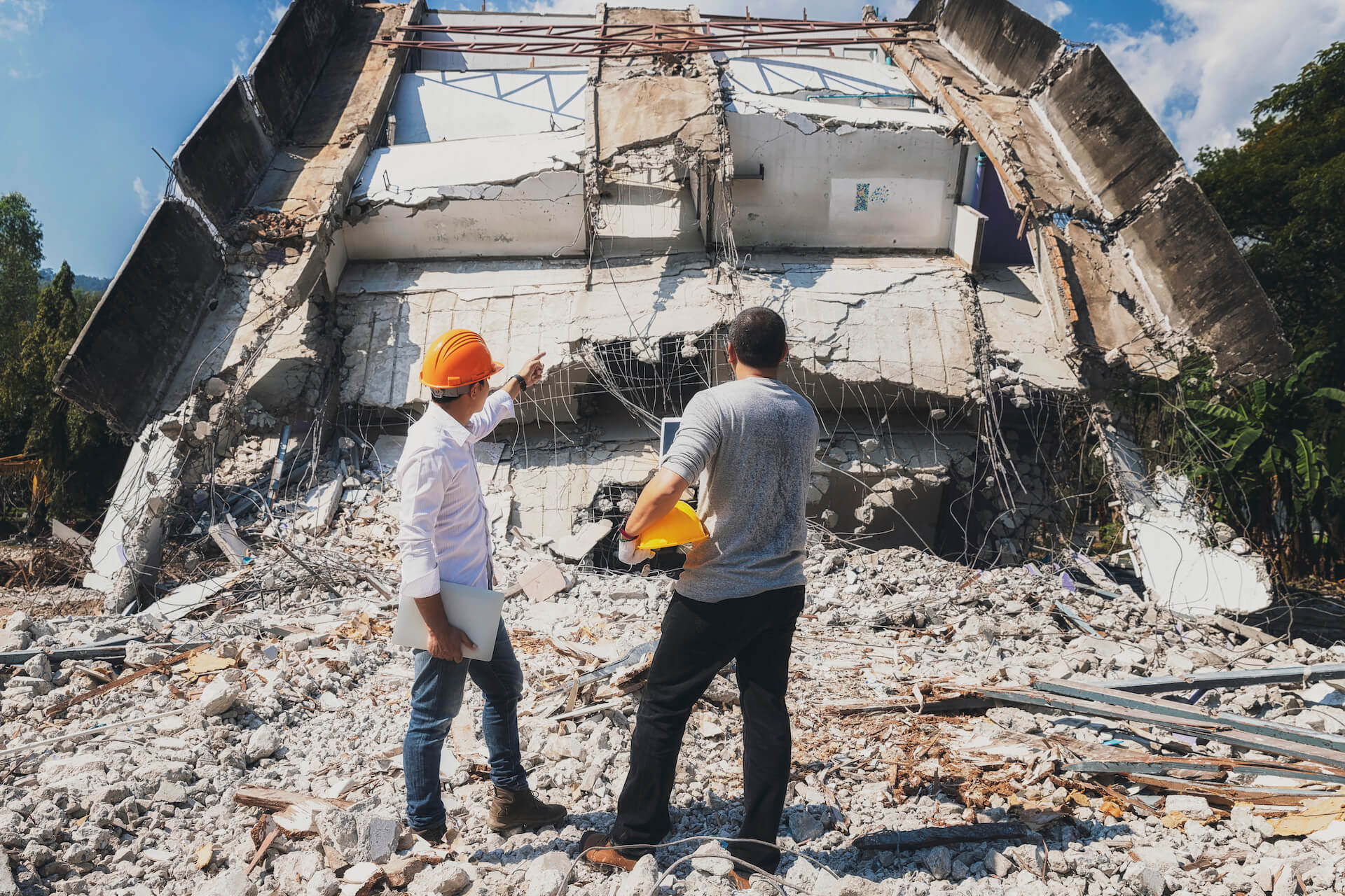 Civil demolition contractors discussing a project on site | Featured image for the Civil Demolition Contractors Page of Gumdale Demolition.