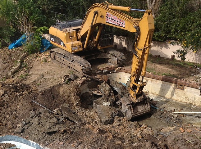 Demolishing a swimming pool | Featured image for Commercial Demolition Brisbane page Gumdale Demolitions
